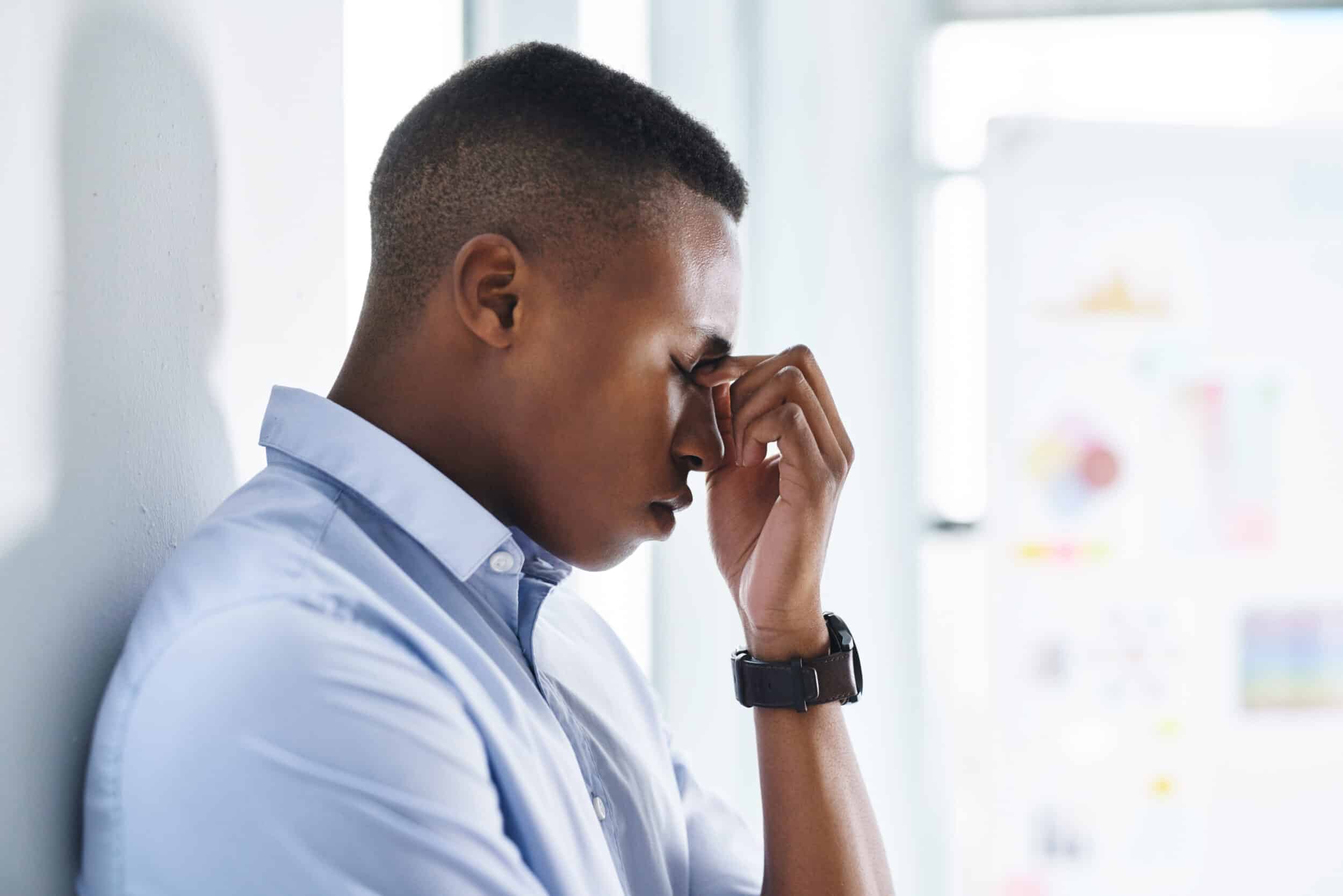 Shot of a young and suffering from a sinus infection