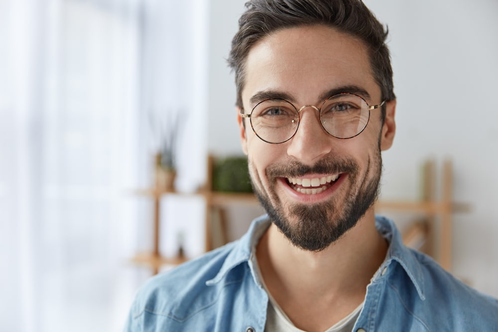 Man smiles after his nasal endoscopy, with no lingering discomfort.