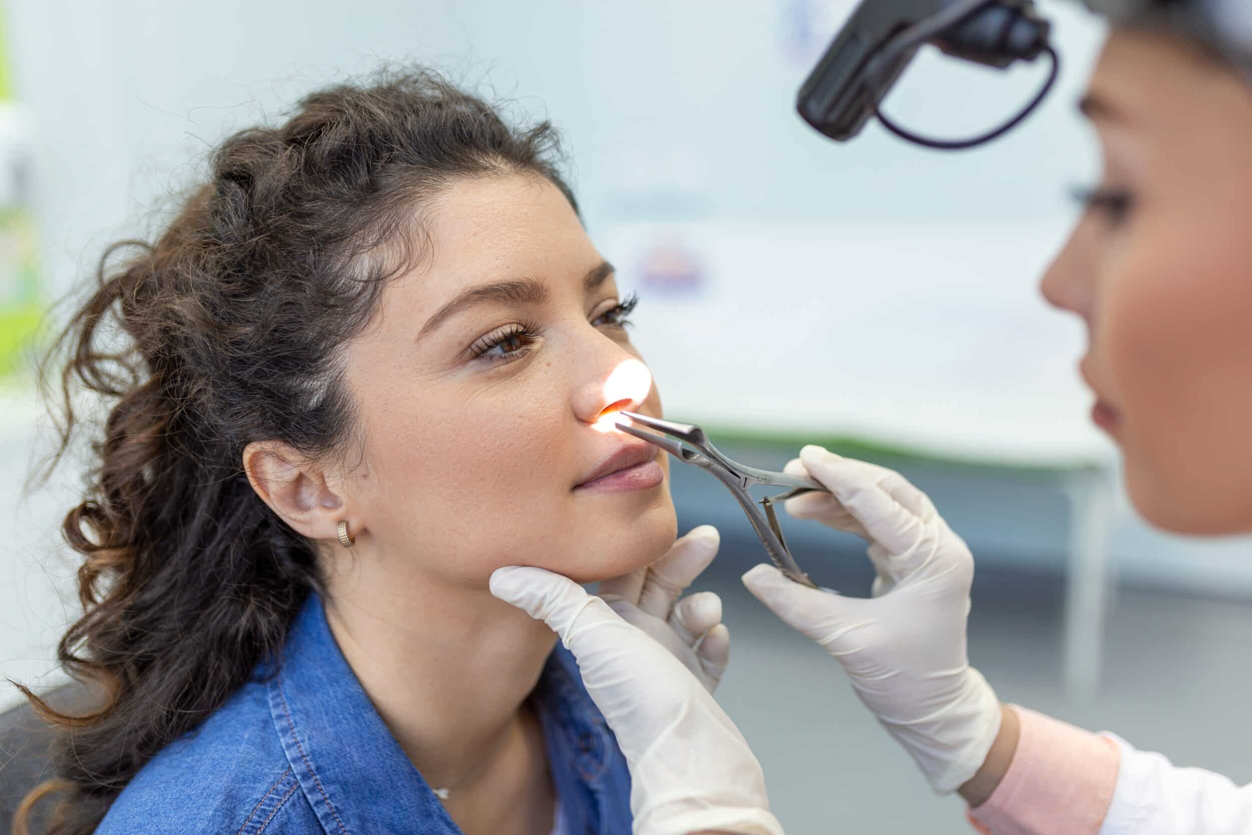 Woman undergoes a sinus test to check her health. Lab reports to follow