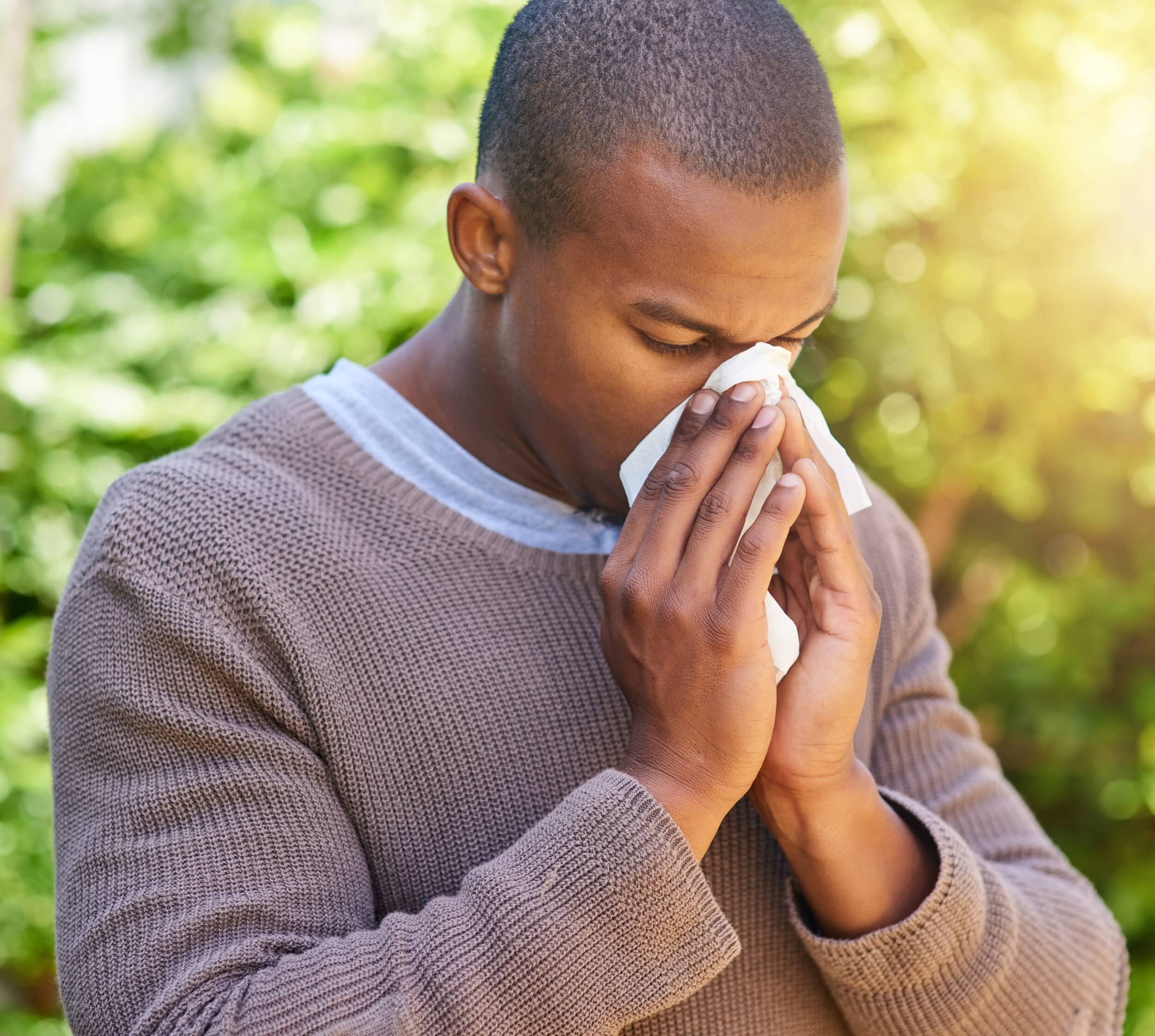 A person experiencing nasal symptoms